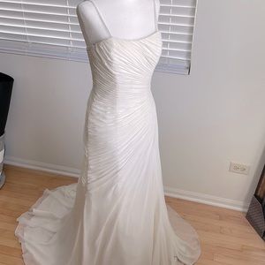 Strapless size 4 cream color brides dress. Used.